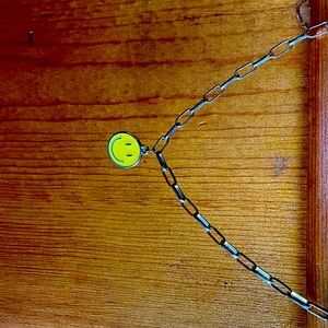 a yellow smiley face necklace!